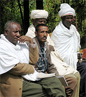 Ethiopian men looking attentive