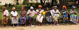 women waiting in a row in Kissidougou, Guinea