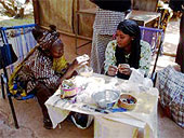 Women from Mali making jewelry